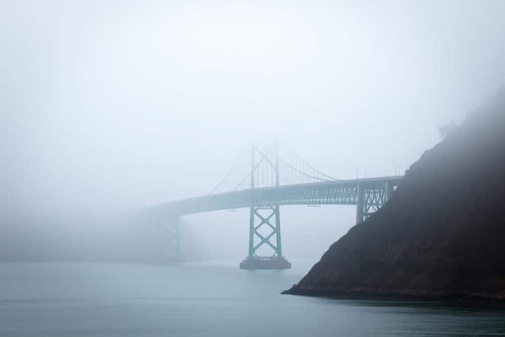 Foggy morning view of the Astoria-Megler Bridge crossing the Columbia River