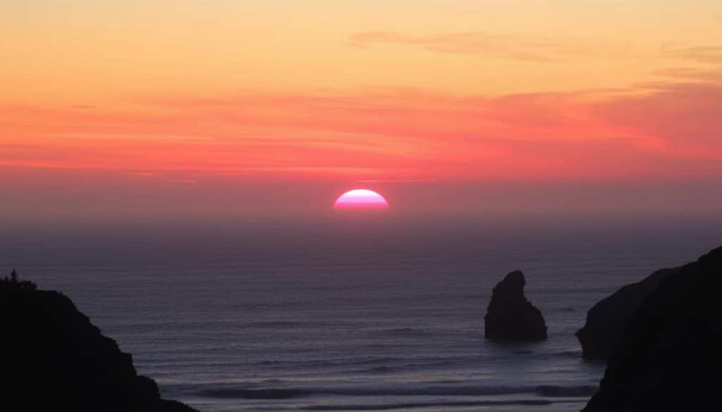 Sunset over the Pacific Ocean from Cape Perpetua during Oregon Coast road trip