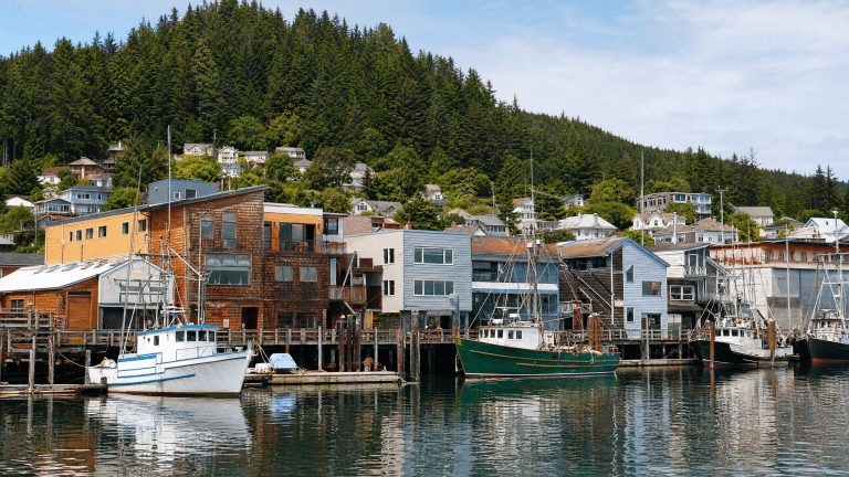Historic waterfront town with fishing boats and wooden docks