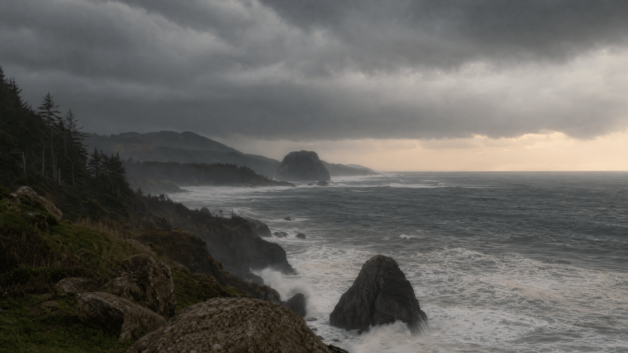 Dramatic storm clouds and rough ocean waves at Coos Bay on the Oregon Coast