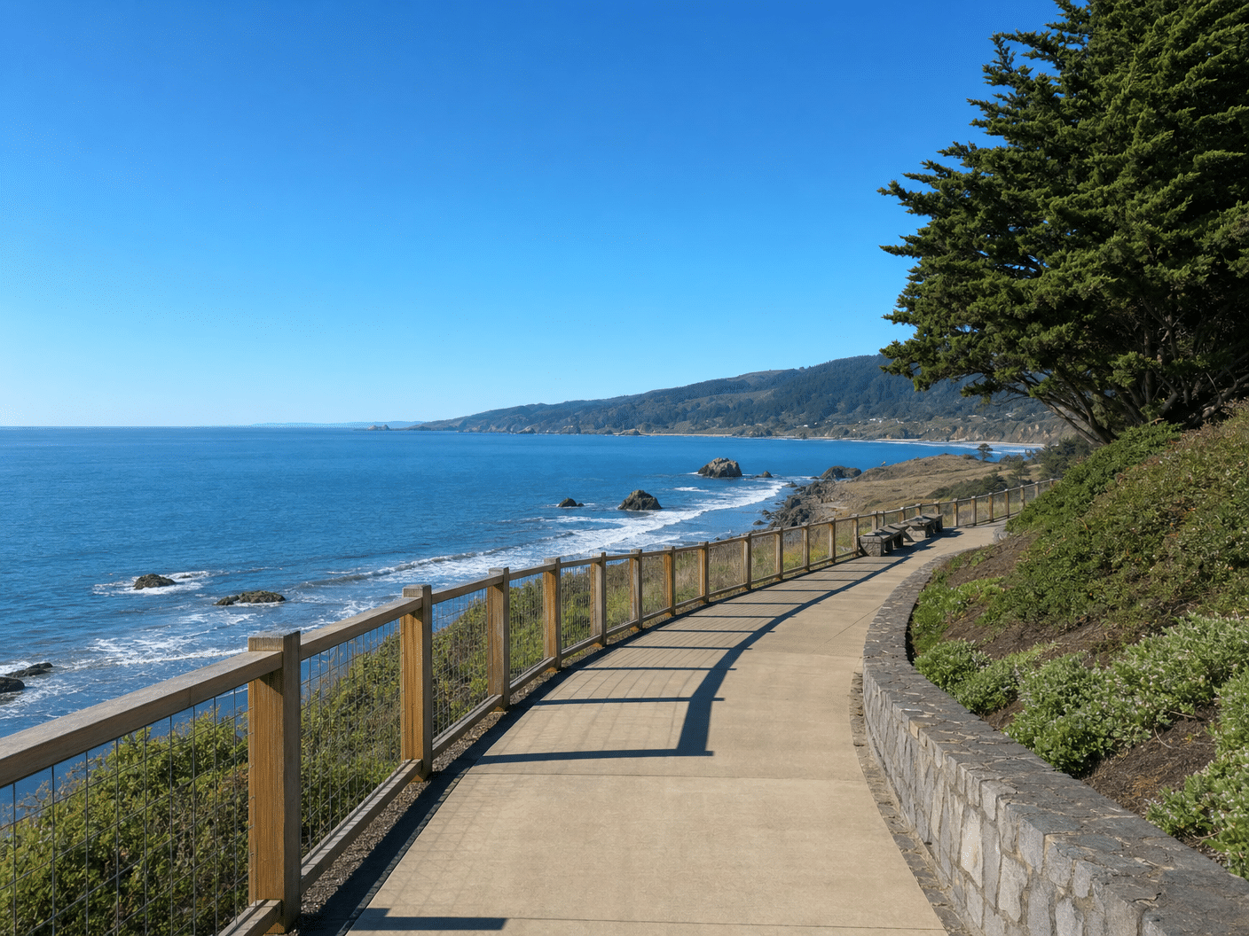 Accessible paved pathway offering ocean views along Cannon Beach