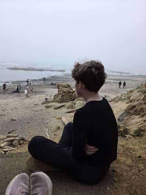 One of my sons looking at the ocean on the Oregon coast